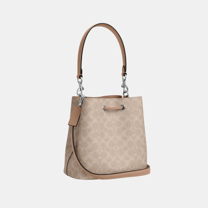 CBH07-Rowan Bucket Bag in Signature Canvas-Sv/Sand/Taupe