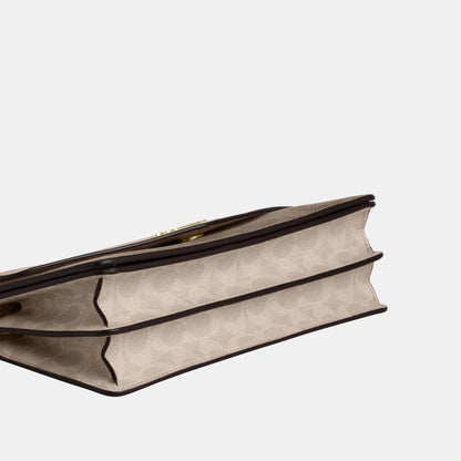 Klare Envelope Crossbody Bag In Blocked Signature Canvas