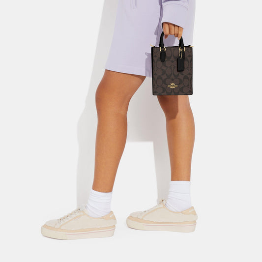 CJ494-North South Mini Tote In Signature Canvas-Im/Brown Black