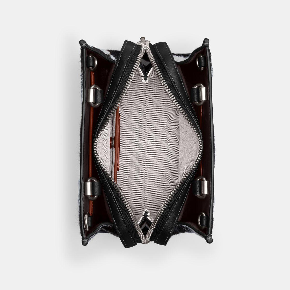 CM564-Rogue 20 In Haircalf With Zebra Print-LH/Zebra