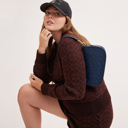 CN055-Swinger In Signature Leather-B4/Deep Blue