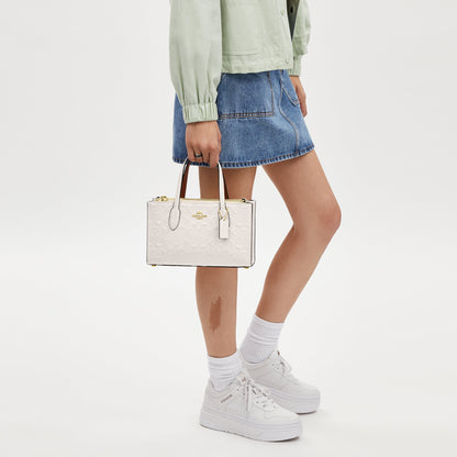 Nina Small Tote Bag In Signature Leather