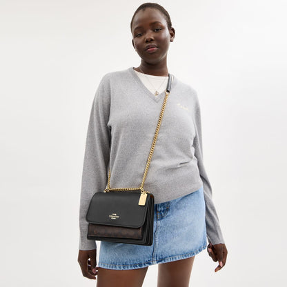 CV978-KLARE CROSSBODY BAG IN SIGNATURE CANVAS-IM/Walnut/Black