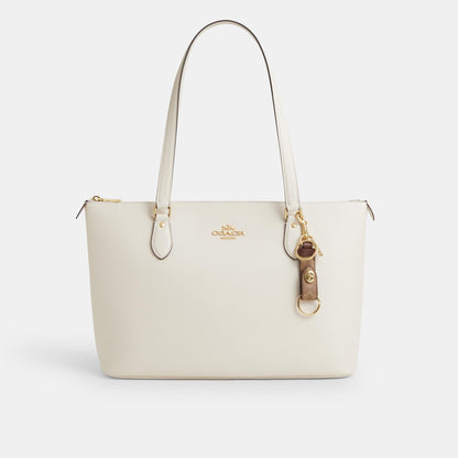 CY235-Trigger Snap Bag Charm In Signature Canvas-Im/Tan/Brown