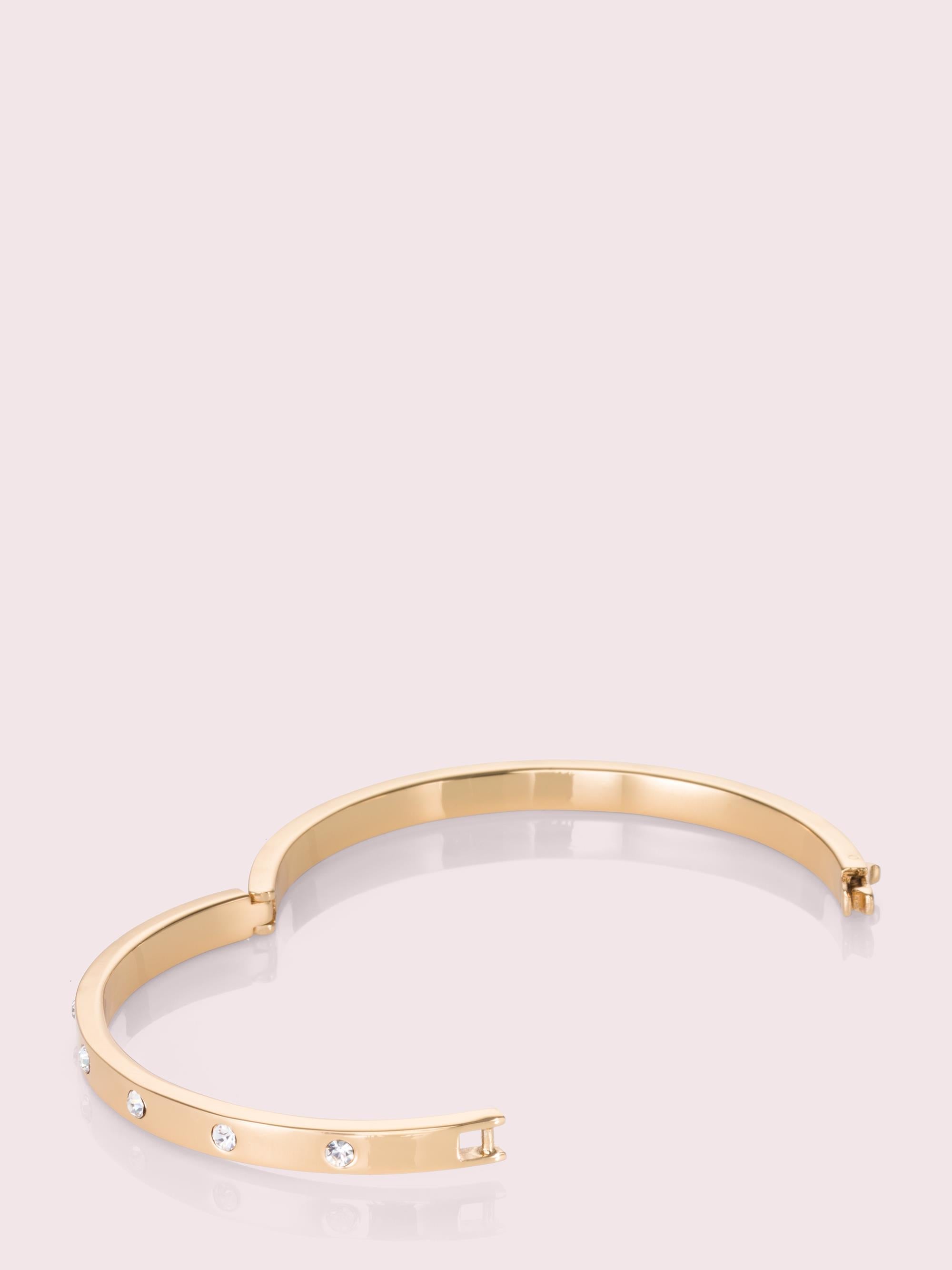 WBRUB744-Clear/Gold-set in stone hinged bangle