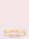 WBRUB744-Clear/Gold-set in stone hinged bangle
